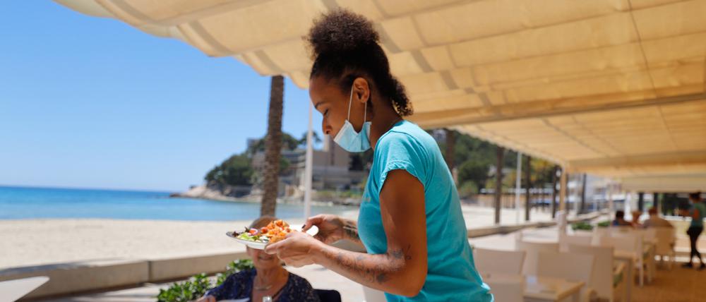 Auch im Tourismus arbeiten in Spanien zahlreiche Migranten.