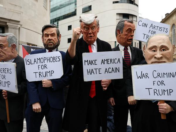 Demonstrators wearing masks take part in a 'Trump Not Welcome' protest during the state visit of U.S. President Donald Trump and first lady Melania Trump, in London, Britain, September 17, 2025. REUTERS/Hannah McKay
