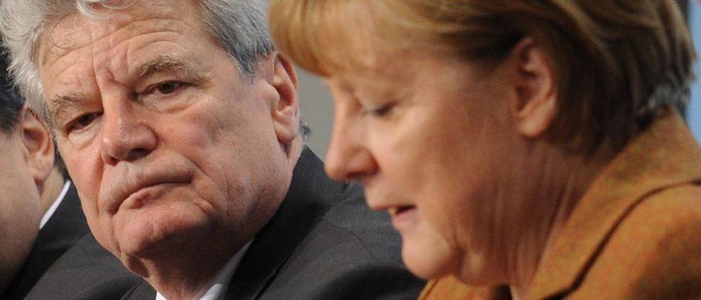 Joachim Gauck und Angela Merkel auf einem Archivfoto von 2012.
