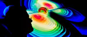 Gravitationswellen, hier vom Computer visualisierst, sind unsichtbar und nur mit riesigen, aufwändigen Detektoren messbar. Der modernste, das Einstein-Teleskop, könnte in der Lausitz und auf Sardinien entstehen.
