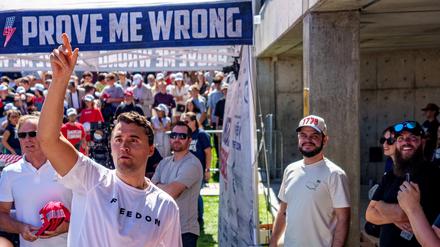 U.S. right-wing activist and commentator Charlie Kirk throws hats to the crowd shortly before he was shot at a Utah Valley University speaking event in Orem, Utah, U.S. September 10, 2025. Trent Nelson/The Salt Lake Tribune via REUTERS.
NO RESALES. NO ARCHIVES. THIS IMAGE HAS BEEN SUPPLIED BY A THIRD PARTY