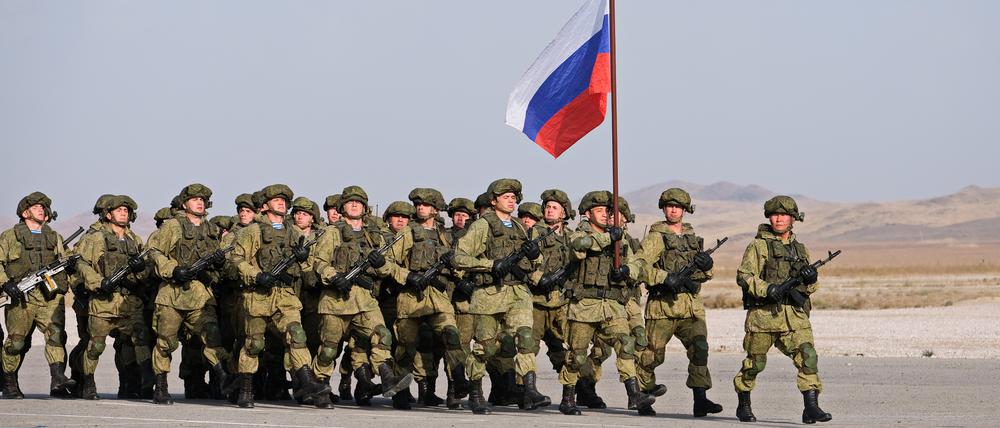 Almaty / Kazakhstan - 10.01.2018 : Military tactical exercises. Soldiers of the armed forces and The Russian flag