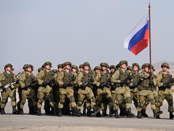Almaty / Kazakhstan - 10.01.2018 :  Military tactical exercises. Soldiers of the armed forces and The Russian flag