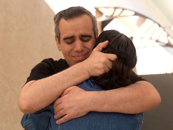 Released Israeli hostage, Omri Miran, held in Gaza since the deadly October 7, 2023 attack by Hamas, embraces his wife, Lishay Miran-Lav, after being released as part of a prisoner-hostage swap and a ceasefire deal between Israel and Hamas, in Reim, Israel October 13, 2025. Israel Defense Forces/Handout via REUTERS     THIS IMAGE HAS BEEN SUPPLIED BY A THIRD PARTY