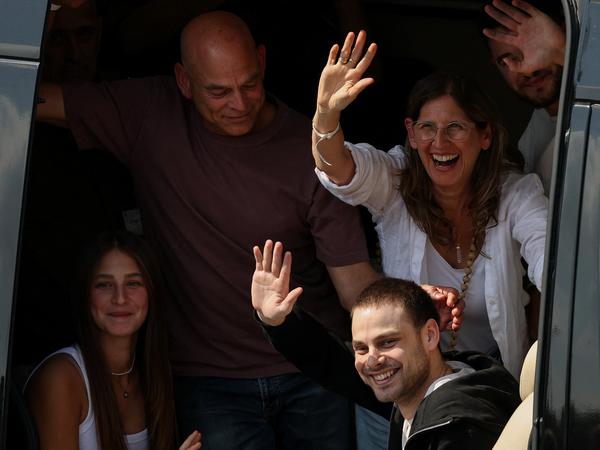 Released hostage Alon Ohel, who was kidnapped during the deadly October 7, 2023 attack by Hamas and taken to Gaza, gestures upon arrival at Rabin Medical Center-Beilinson Hospital, amid a hostages-prisoners swap and a ceasefire deal between Israel and Hamas in Gaza, in Petah Tikva, Israel October 13, 2025. REUTERS/Stoyan Nenov