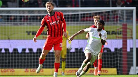 Niklas Dorsch und Heidenheim holen einen Punkt gegen Bremen.