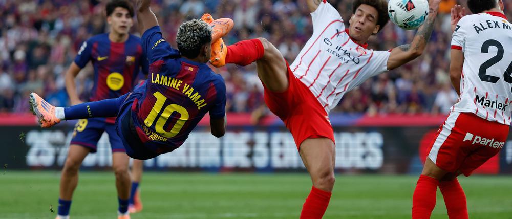 Barcelona mit Lamine Yamal (l) siegte gegen Girona mit dem früheren Dortmunder Axel Witsel.