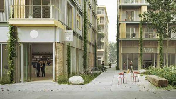 Ein Gebäude mit Wellblechfassade und Balkonen, ein anderes mit Holzfassade – so plant das Architekturbüro Kaden+ zwei Wohnhäuser am Dragonerareal in Kreuzberg.