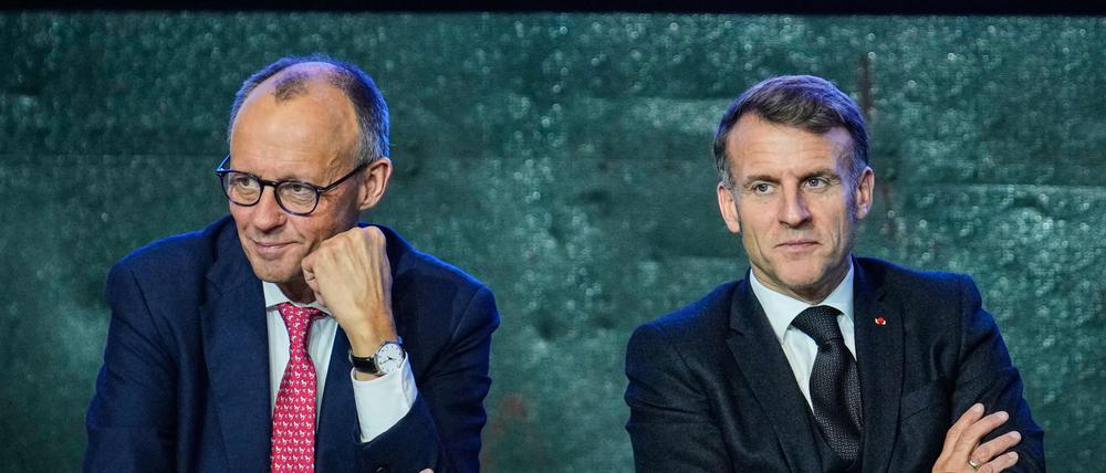 Der französische Präsident Emmanuel Macron und der deutsche Bundeskanzler Friedrich Merz sind auf dem Gipfeltreffen zur technologischen Souveränität Europas am 18. November 2025 auf dem EUREF-Campus in Berlin zu sehen.