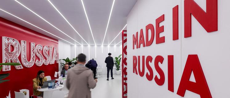 A man walks at the Russia booth at the 8th China International Import Expo (CIIE) in Shanghai, China, November 6, 2025.REUTERS/Maxim Shemetov