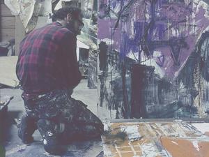 Emilio Vedova 1964 in seinem Atelier in Berlin-Dahlem bei der Vorbereitung eines „Plurimo“.