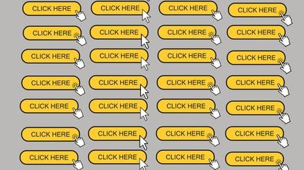 Internet-Button mit der Aufschrift „Click Here“.