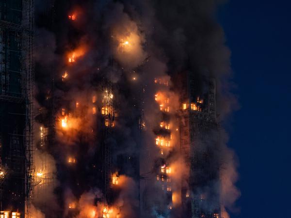 Hong Kong Building Fire Smoke and flames rise as a major fire engulfs several residential buildings at Wang Fuk Court on November 26, 2025 in Hong Kong. Serval residential building in Wang Fuk Court located in Tai Po District caught fire today, the Hong Kong Fire Department has issued the No.5 fire alarm, the fire at local time 1800 has claimed the life of one firefighter and three other people. Photo by Vernon Yuen/Nexpher Images Hong Kong