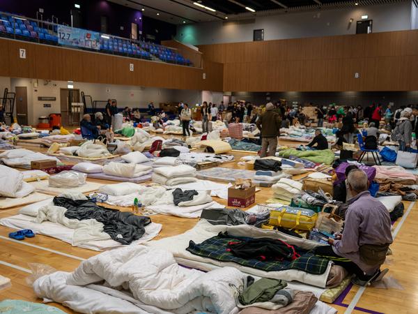 Hong Kong Building Fire A general view showing a temporary shelter as a major fire engulfs several residential buildings at Wang Fuk Court on November 27, 2025 in Hong Kong. Serval residential building in Wang Fuk Court located in Tai Po District caught fire today, the Hong Kong Fire Department has issued the No.5 fire alarm, the fire at local time 2000 - 65 Dead. Photo by Vernon Yuen/Nexpher Images Hong Kong
