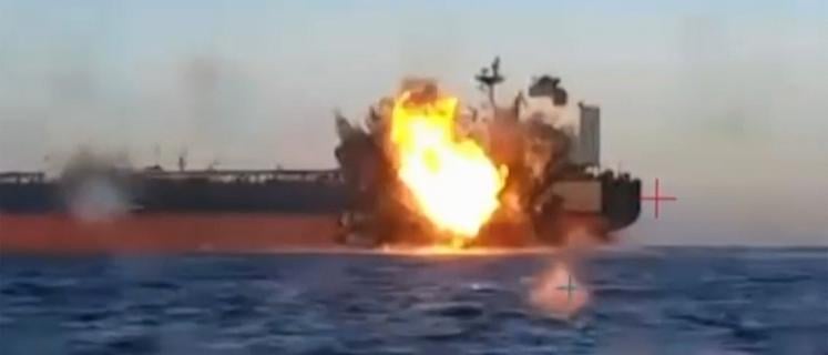 This video grab taken from images released by the Security service of Ukraine (SBU) on November 29, 2025, shows smoke rising from a cargo ship on fire in the Black Sea off the Turkish coast, amid the ongoing Russian-Ukrainian conflict. Images put out by the Ukraine Security Service show what they say are sea drone attacks on tankers in the Black Sea that Kyiv believes were transporting sanctioned Russian oil. The two tankers were rocked by explosions in Turkish waters late overnight and early on November 29, 2025, according to Turkey's transport ministry. (Photo by SECURITY SERVICE OF UKRAINE / AFP) / RESTRICTED TO EDITORIAL USE - MANDATORY CREDIT "AFP PHOTO /  - / SECURITY SERVICE OF UKRAINE /  " - NO MARKETING NO ADVERTISING CAMPAIGNS - DISTRIBUTED AS A SERVICE TO CLIENTS  Oil0112