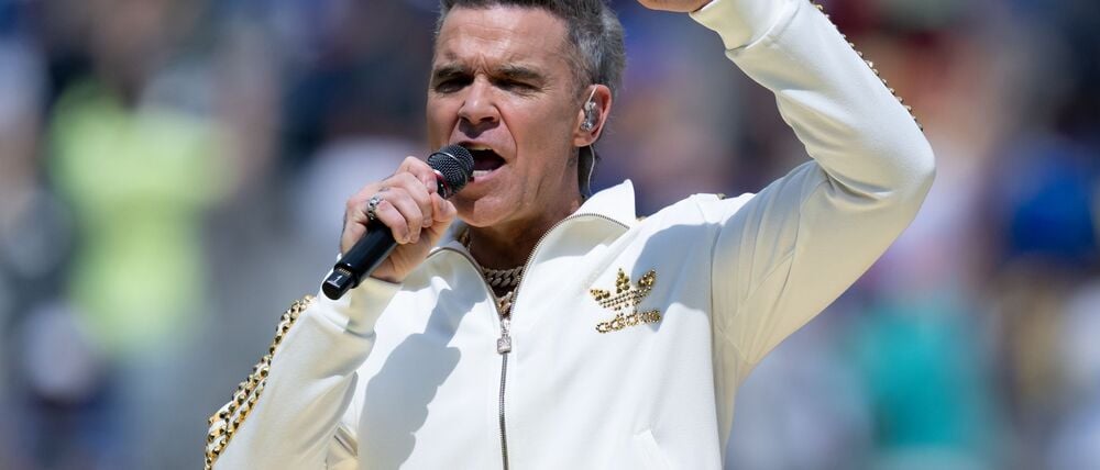 Sein einziges Deutschlandkonzert führt Robbie Williams 2026 nach Düsseldorf. (Archivbild)