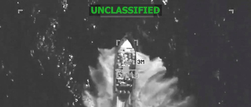 A U.S. military strike on what they said was a suspected drug vessel in international waters, at a location given as the Eastern Pacific in the screen grab from handout video released December 4, 2025.      U.S. Southern Command/Handout via REUTERS    THIS IMAGE HAS BEEN SUPPLIED BY A THIRD PARTY. OVERLAY AND WATERMARK FROM SOURCE.

VERIFICATION LINES: 
- Reuters was not able to independently verify the location or the date when the video was filmed. 
- Upon checking this footage, no old results were found. 