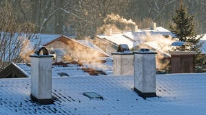 Rauchende Kamine in Ruhpolding. 