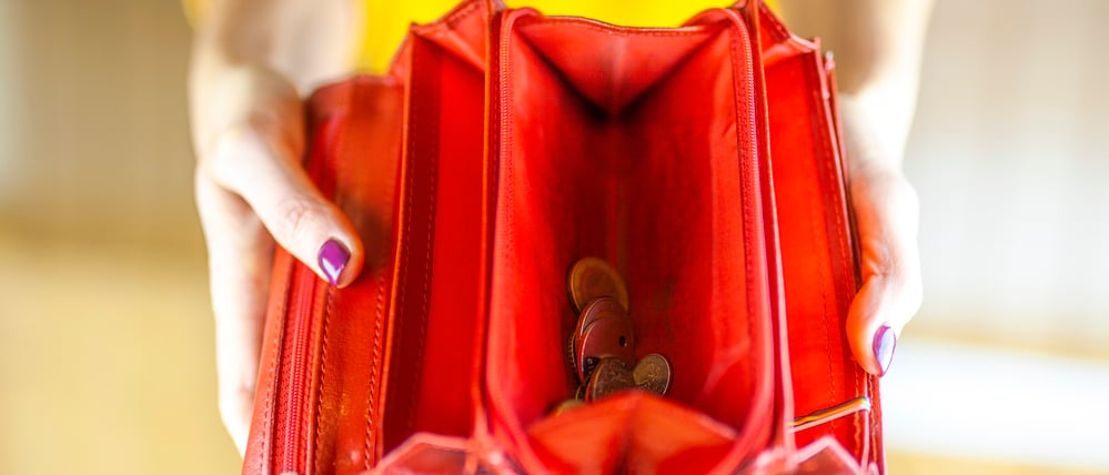 Woman hand holding empty wallet