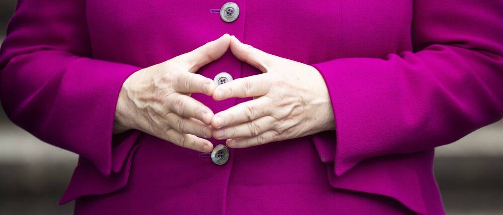 Angela Merkel macht die Raute.