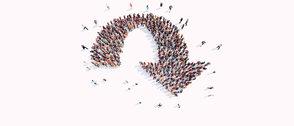 Eine Menschenmenge bildet einen nach unten zeigenden Pfeil (Illustration).