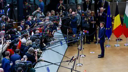 France's President Emmanuel Macron speaks to the media at a European Union leaders' summit in Brussels, Belgium, December 18, 2025. REUTERS/Stephanie Lecocq