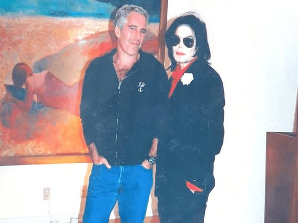 Jeffrey Epstein poses with Michael Jackson in this image released by the Department of Justice in Washington, D.C., U.S., on December 19, 2025 as part of a new trove of documents from its investigations into the late financier and convicted sex offender Jeffrey Epstein. U.S. Justice Department/Handout via REUTERS THIS IMAGE HAS BEEN SUPPLIED BY A THIRD PARTY