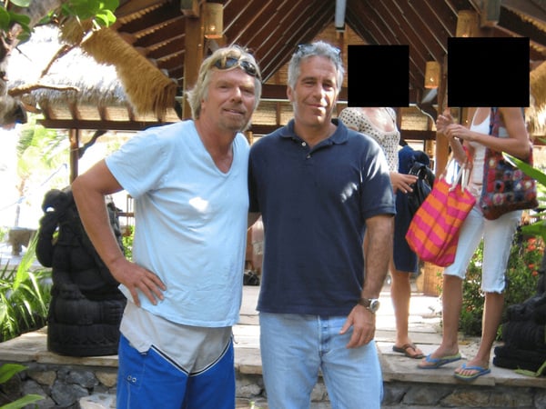 Jeffrey Epstein and Richard Branson are seen in this image released by the Department of Justice in Washington, D.C., U.S., on December 19, 2025 as part of a new trove of documents from its investigations into the late financier and convicted sex offender Jeffrey Epstein. U.S. Justice Department/Handout via REUTERS THIS IMAGE HAS BEEN SUPPLIED BY A THIRD PARTY REDACTED AREAS FROM SOURCE.
