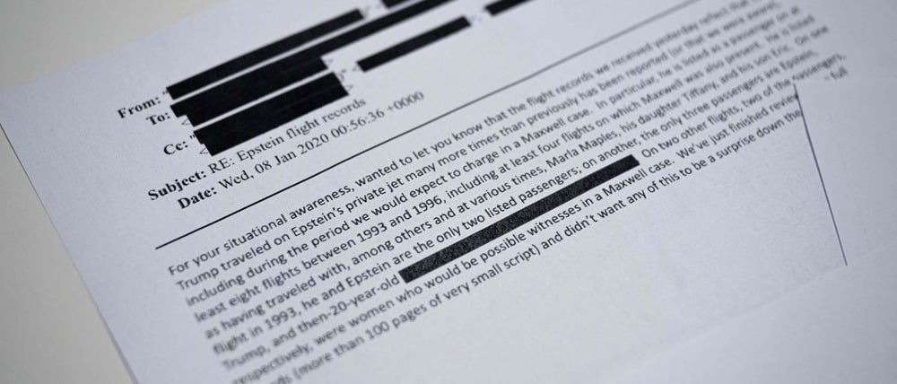 This photo illustration taken in Washington, DC, on December 23, 2025 shows part of a new batch of files released on Tuesday by the US government in relation to the notorious late sex offender Jeffrey Epstein containing numerous references to Donald Trump, including documents detailing flights he took on his then close friend's private jet. Epstein cultivated a wide circle of powerful friends, including Trump, and was alleged to have run an underage sex trafficking ring before his 2019 death in jail. Trump, who is not accused of any wrongdoing, fought for months to prevent the release of the vast trove of documents collected during years of investigations into the disgraced financier. (Photo by AFP)