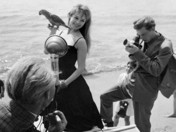 (FILES) French actress Brigitte Bardot poses with a parrot during the 9th edition of the Cannes film festival, on April 25, 1956. French actress Brigitte Bardot died at 91 AFP learned from Bardot foundation on December 28, 2025. (Photo by Pierre MEUNIER / AFP)