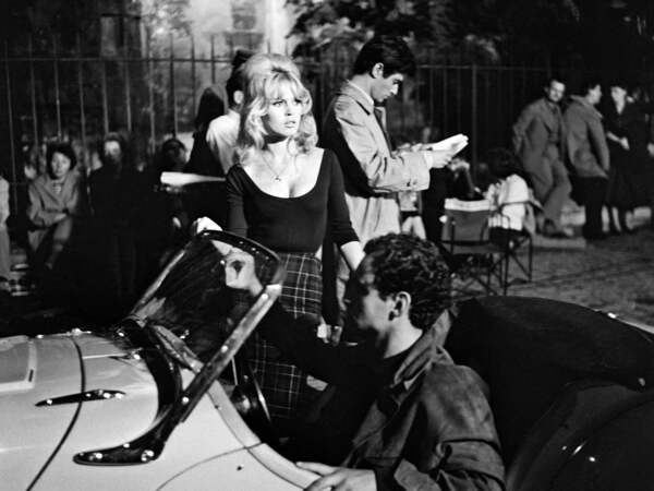 (FILES) A photo taken in August 1960 at Joinville's studio shows French actors Brigitte Bardot (2nd L), Sami Frey (C, standing) on the set of "La Vérité" directed by Henri-Georges Clouzot. French actress Brigitte Bardot died at 91 AFP learned from Bardot foundation on December 28, 2025. (Photo by AFP)