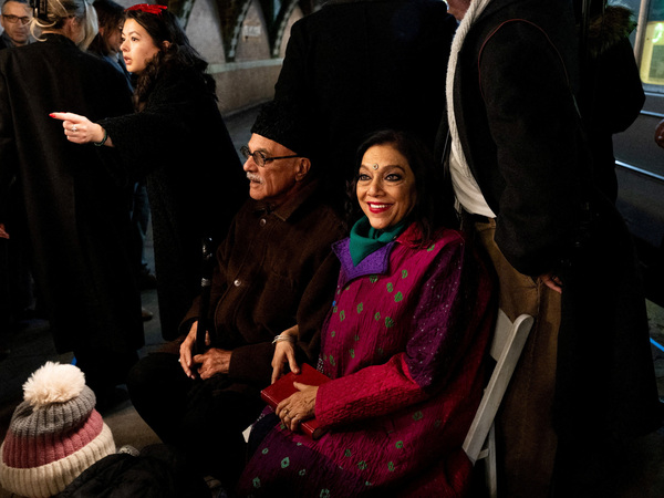 FILE PHOTO: Zohran Mamadni's mother, Mira Nair, and his father, Mahmood Mamdani, watch as he is sworn in as mayor of New York City at Old City Hall Station, New York, U.S., Thursday, Jan 1st 2026. Amir Hamja/Pool via REUTERS/File Photo