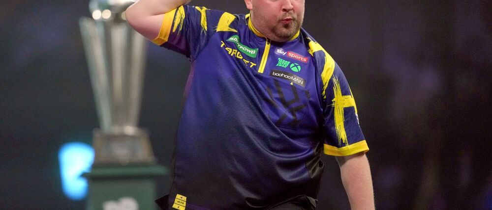 Littler bejubelt sein Finish von 170 Punkten.