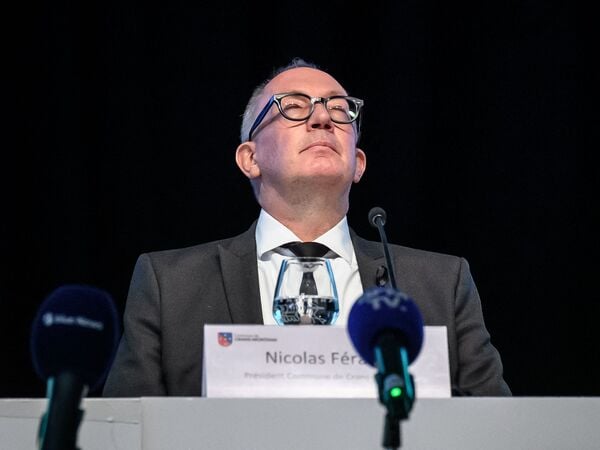 Crans-Montana Mayor Nicolas Feraud attends a press conference by the city council of the resort of Crans-Montana on January 6, 2026, following the devastating New Year bar blaze. Swiss local authorities admitted on January 6 they failed to conduct periodic fire and safety inspections over the past five years at a bar where an inferno killed 40 people and injured 116 others. (Photo by Fabrice COFFRINI / AFP)