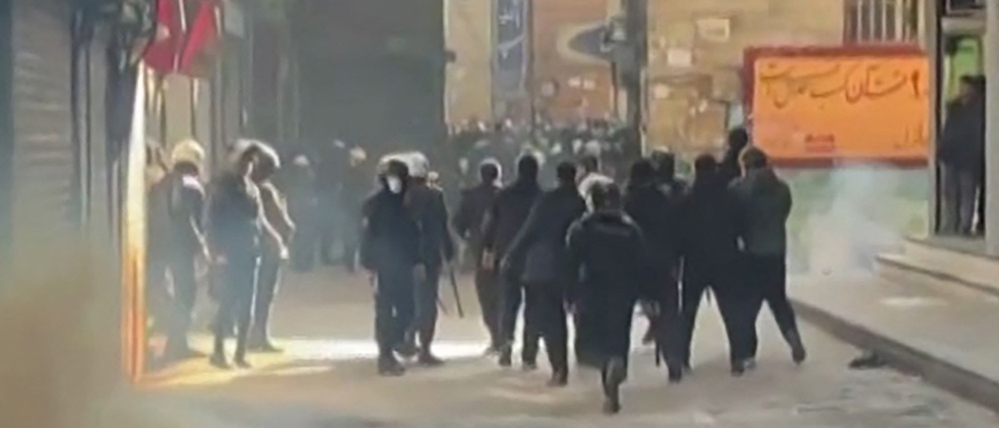 This grab taken on January 6, 2026, from UGC images posted on social media the same day shows Iranian security forces using tear gas to disperse demonstrators in the Tehran bazaar. Iran will offer no leniency to "rioters", though the public has a right to demonstrate, the head of the country's judiciary said on January 5, 2026, following more than a week of sometimes-deadly protests.
Protests erupted on December 28 when shopkeepers in capital Tehran staged a strike over high prices and economic stagnation. They have since spread to other cities and expanded to include political demands. (Photo by UGC / AFP) / Israel OUT / RESTRICTED TO EDITORIAL USE - MANDATORY CREDIT "AFP PHOTO / UGC / ANONYMOUS" - NO MARKETING - NO ADVERTISING CAMPAIGNS - NO INTERNET - DISTRIBUTED AS A SERVICE TO CLIENTS - NO RESALE - NO ARCHIVE -NO ACCESS ISRAEL MEDIA/PERSIAN LANGUAGE TV STATIONS OUTSIDE IRAN/ STRICTLY NO ACCESS BBC PERSIAN/ VOA PERSIAN/ MANOTO-1 TV/ IRAN INTERNATIONAL/RADIO FARDA - AFP IS NOT RESPONSIBLE FOR ANY DIGITAL ALTERATIONS TO THE PICTURE'S EDITORIAL CONTENT / 