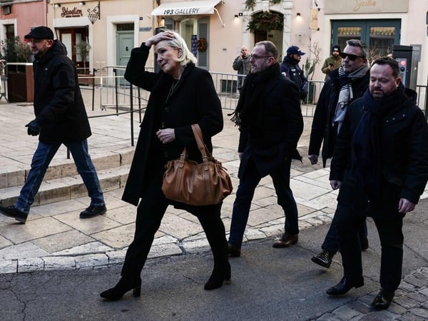 President of French far right party Rassemblement National Marine Le Pen (L) arrives at Notre-Dame de l'Assomption church, for the funeral ceremony for late French actress Brigitte Bardot, in Saint-Tropez, southeastern France, on January 7, 2026. French film sensation Brigitte Bardot, a symbol of sexual liberation in the 1950s and 1960s who reinvented herself as an animal rights defender and embraced far-right views, died on Decmber 28, 2025 aged 91. (Photo by Thibaud MORITZ / AFP)