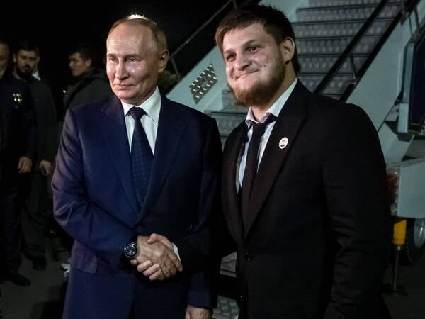 RUSSIA, GROZNY - AUGUST 21, 2024: Russia s President Vladimir Putin L shakes hands with Chechen Republic Head Ramzan Kadyrovs son, the Chechen Republic s minister of physical culture and sport Akhmat Kadyrov, before departing from Grozny International Airport. Vyacheslav Prokofyev/Russian President Press Office/TASS PUBLICATIONxINxGERxAUTxONLY 73222187