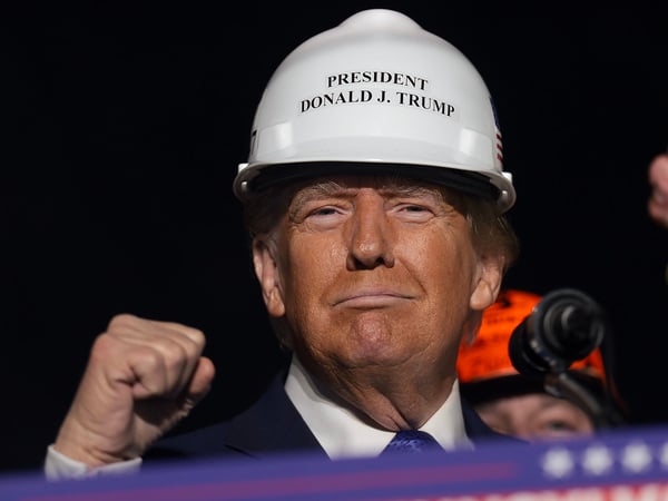 LATROBE, PENNSYLVANIA - OCTOBER 19: Republican presidential nominee, former U.S. President Donald Trump, wears a hard hat given to him by steelworkers during a campaign rally on October 19, 2024, in Latrobe, Pennsylvania. There are 17 days remaining until the U.S. presidential election, which will take place on Tuesday, November 5, 2024. (Photo by Win McNamee/Getty Images)