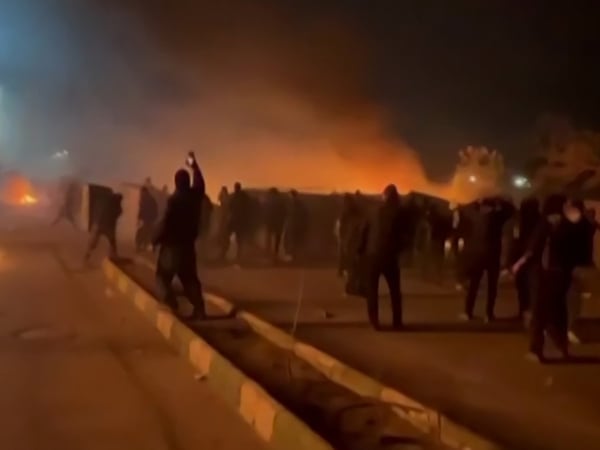This video grab taken on January 13, 2026 from UGC images posted on social media on January 10, 2026 shows clashes in Mashhad, in northeastern Iran. A violent crackdown on a wave of protests in Iran has killed at least 648 people, a rights group said on January 12, 2026, as Iranian authorities sought to regain control of the streets with mass nationwide rallies. (Photo by UGC / AFP) / Israel OUT / RESTRICTED TO EDITORIAL USE - MANDATORY CREDIT AFP -  SOURCE: ANONYMOUS - NO MARKETING - NO ADVERTISING CAMPAIGNS  - DISTRIBUTED AS A SERVICE TO CLIENTS - NO RESALE - NO ARCHIVE - NO ACCESS ISRAEL MEDIA/PERSIAN LANGUAGE TV STATIONS OUTSIDE IRAN/ STRICTLY NO ACCESS BBC PERSIAN/ VOA PERSIAN/ MANOTO-1 TV/ IRAN INTERNATIONAL/RADIO FARDA - AFP IS NOT RESPONSIBLE FOR ANY DIGITAL ALTERATIONS TO THE PICTURE'S EDITORIAL CONTENT / 