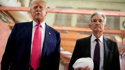 FILE PHOTO: U.S. President Donald Trump and Federal Reserve Chair Jerome Powell speak during a tour of the Federal Reserve Board building, which is currently undergoing renovations, in Washington, D.C., U.S., July 24, 2025. REUTERS/Kent Nishimura/File Photo