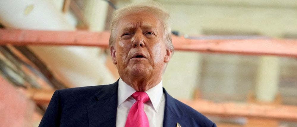 FILE PHOTO: U.S. President Donald Trump and Federal Reserve Chair Jerome Powell speak during a tour of the Federal Reserve Board building, which is currently undergoing renovations, in Washington, D.C., U.S., July 24, 2025. REUTERS/Kent Nishimura/File Photo