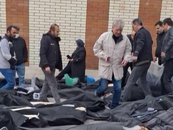 EDITORS NOTE: Graphic content / TOPSHOT - This video grab taken on January 14, 2026 from UGC images posted on social media on January 13, 2026, shows dozens of bodies lying on the ground at the Tehran Province Forensic Diagnostic and Laboratory Centre in Kahrizak, as grieving relatives search for their loved ones. Other videos showing the same scenes first appeared online on January 10, 2026.
A violent crackdown on a wave of protests in Iran has killed at least 648 people, a rights group said on January 12, 2026, as Iranian authorities sought to regain control of the streets with mass nationwide rallies. (Photo by UGC / AFP) / Israel OUT / RESTRICTED TO EDITORIAL USE - MANDATORY CREDIT AFP -  SOURCE: ANONYMOUS - NO MARKETING - NO ADVERTISING CAMPAIGNS  - DISTRIBUTED AS A SERVICE TO CLIENTS - NO RESALE - NO ARCHIVE - NO ACCESS ISRAEL MEDIA/PERSIAN LANGUAGE TV STATIONS OUTSIDE IRAN/ STRICTLY NO ACCESS BBC PERSIAN/ VOA PERSIAN/ MANOTO-1 TV/ IRAN INTERNATIONAL/RADIO FARDA - AFP IS NOT RESPONSIBLE FOR ANY DIGITAL ALTERATIONS TO THE PICTURE'S EDITORIAL CONTENT / 