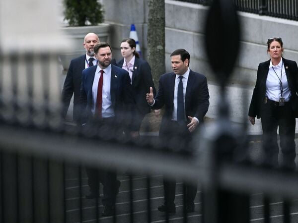 (L/R) US Vice President JD Vance and Secretary of State Marco Rubio depart the Eisenhower Executive Office Building on the White House campus after a meeting with Danish Foreign Minister Lars Løkke Rasmussen and Greenland's Foreign Minister Vivian Motzfeldt in Washington, DC, on January 14, 2026. US President Donald Trump insisted Wednesday the US needs to take control of Greenland, with NATO's support, just hours before talks about the Arctic island with top Danish, Greenlandic and US officials. Hours before the meeting with US Vice President JD Vance was due to start, Trump said that US control of Greenland -- an autonomous territory belonging to NATO ally Denmark -- was "vital" for his planned Golden Dome air and missile defense system. (Photo by Brendan SMIALOWSKI / AFP)