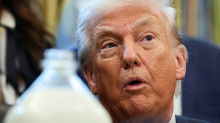 U.S. President Donald Trump participates in a signing ceremony for the Whole Milk for Healthy Kids Act in the Oval Office at the White House in Washington, D.C., U.S., January 14, 2026. REUTERS/Evelyn Hockstein