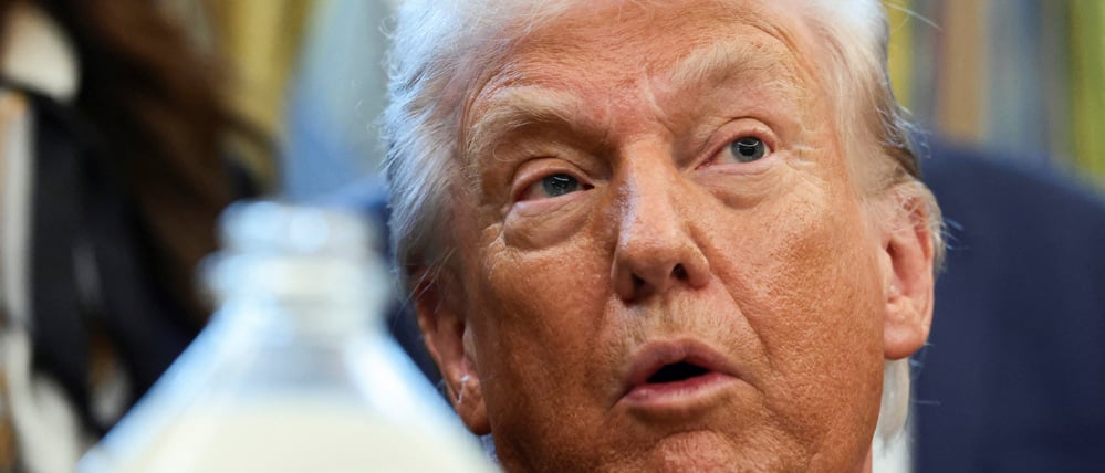 U.S. President Donald Trump participates in a signing ceremony for the Whole Milk for Healthy Kids Act in the Oval Office at the White House in Washington, D.C., U.S., January 14, 2026. REUTERS/Evelyn Hockstein