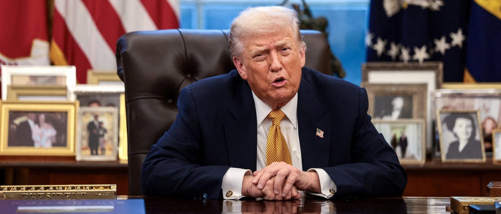 U.S. President Donald Trump is interviewed by Reuters White House correspondent Steve Holland (not pictured) during an exclusive interview in the Oval Office in the White House in Washington, D.C., U.S., January 14, 2026. REUTERS/Evelyn Hockstein     TPX IMAGES OF THE DAY     