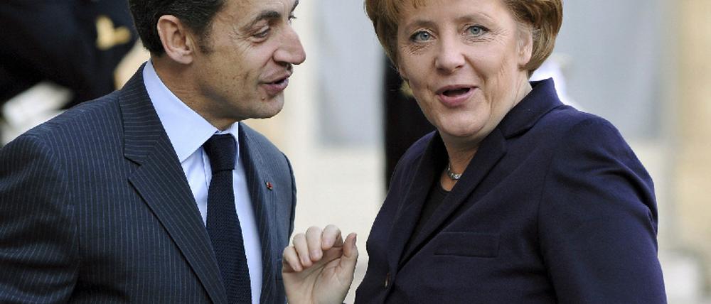 Sarkozy Merkel