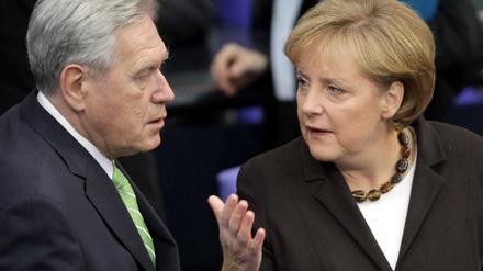 merkel_glos_dpa