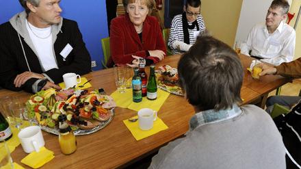 merkel bei aidskranken zik