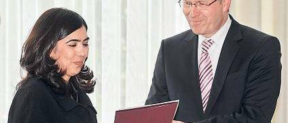Frisch ernannt. Ministerin Özkan und Niedersachsens Regierungschef Wulff. Foto: dpa